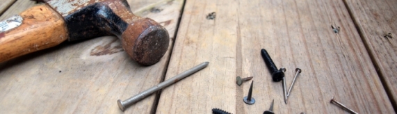 hammer-and-nails-sitting-on-a-edmonton-deck