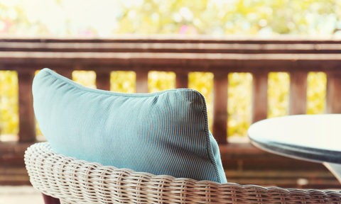blue-and-wicker-patio-furniture-on-a-customer-edmonton-deck