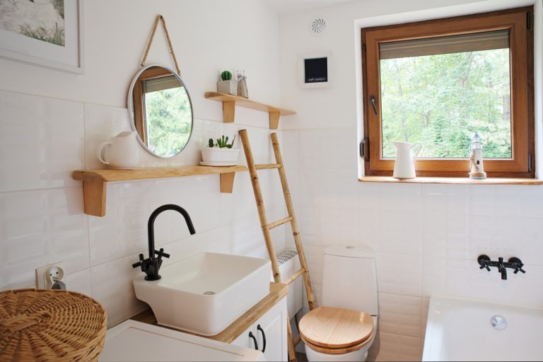 Rustic vintage style of bathroom in white color and wooden decor