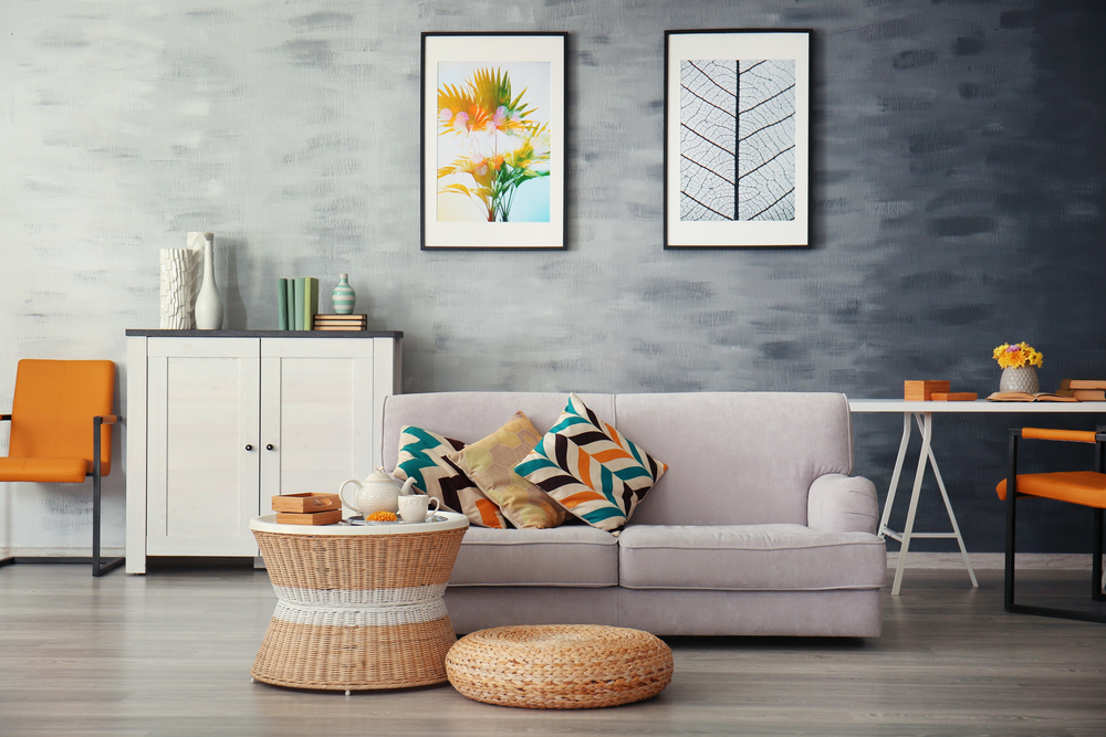 a grey living room with splashes of colour